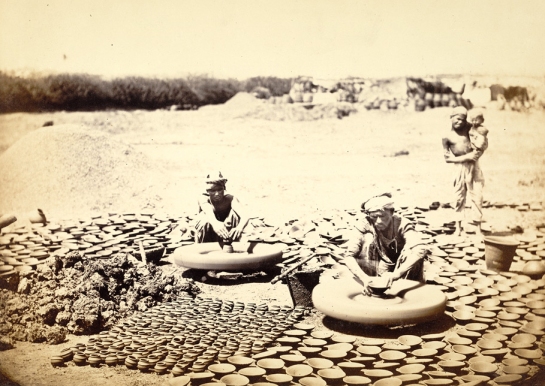08 Two Potters at Work at their Wheels, Surrounded by their Finished Work - Bombay (Mumbai) 1873